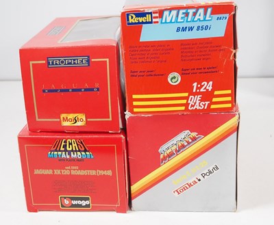 Lot 130 - A group of 1:24 scale diecast cars by BBURAGO,...