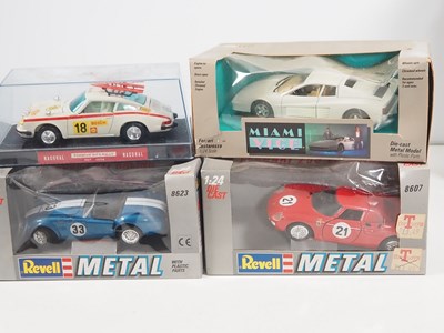 Lot 130 - A group of 1:24 scale diecast cars by BBURAGO,...