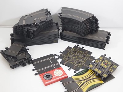 Lot 188 - A large quantity of vintage SCALEXTRIC track...