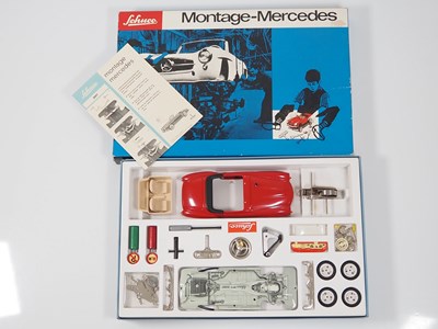 Lot 191 - A SCHUCO 2097 Mercedes 190SL tinplate...