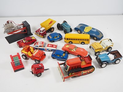 Lot 212 - A large selection of unboxed tinplate vehicles...