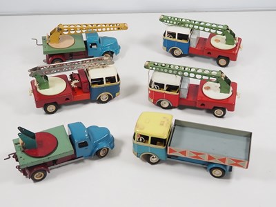 Lot 214 - A group of unboxed tinplate lorries by ITES...