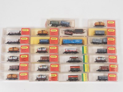 Lot 244 - A large group of MINITRIX N gauge wagons,...