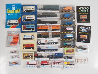 Lot 281 - A group of 1:87 scale plastic cars, vans and...