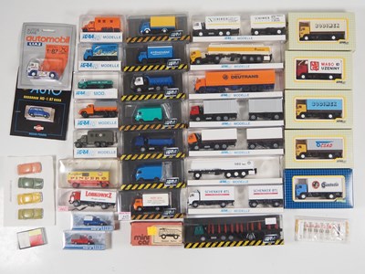 Lot 282 - A group of 1:87 scale plastic cars, vans and...