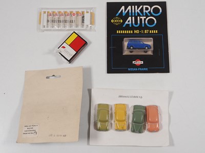 Lot 282 - A group of 1:87 scale plastic cars, vans and...