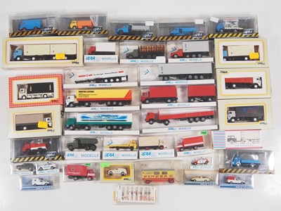 Lot 290 - A group of 1:87 scale plastic cars, vans and...