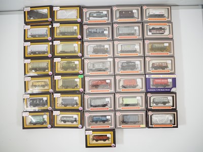 Lot 303 - A large group of DAPOL boxed OO gauge wagons...