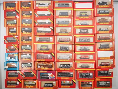 Lot 311 - A very large group of HORNBY boxed OO gauge...