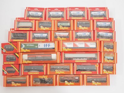 Lot 354 - A large group of HORNBY boxed OO gauge wagons...