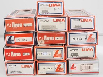 Lot 376 - A large group of LIMA OO gauge boxed coaches,...