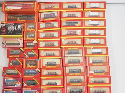 Lot 397 - A very large group of HORNBY boxed OO gauge...