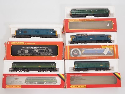 Lot 431 - A group of HORNBY OO gauge diesel and electric...