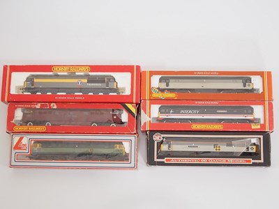 Lot 446 - A mixed group of OO gauge diesel locos by LIMA,...