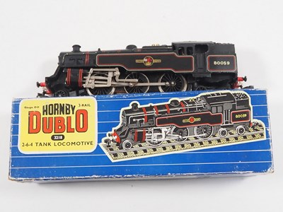 Lot 465 - A pair of HORNBY DUBLO 3-rail OO gauge steam...