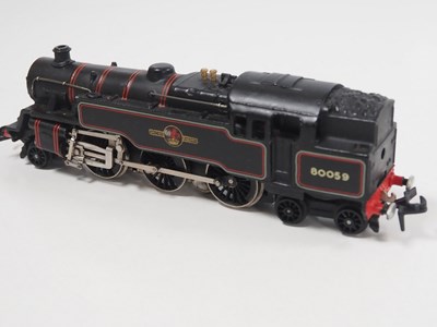 Lot 465 - A pair of HORNBY DUBLO 3-rail OO gauge steam...