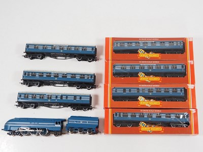 Lot 486 - A group of HORNBY OO gauge rolling stock...