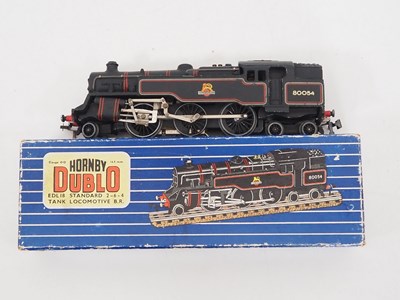 Lot 556 - A group of HORNBY DUBLO 3-rail OO gauge steam...