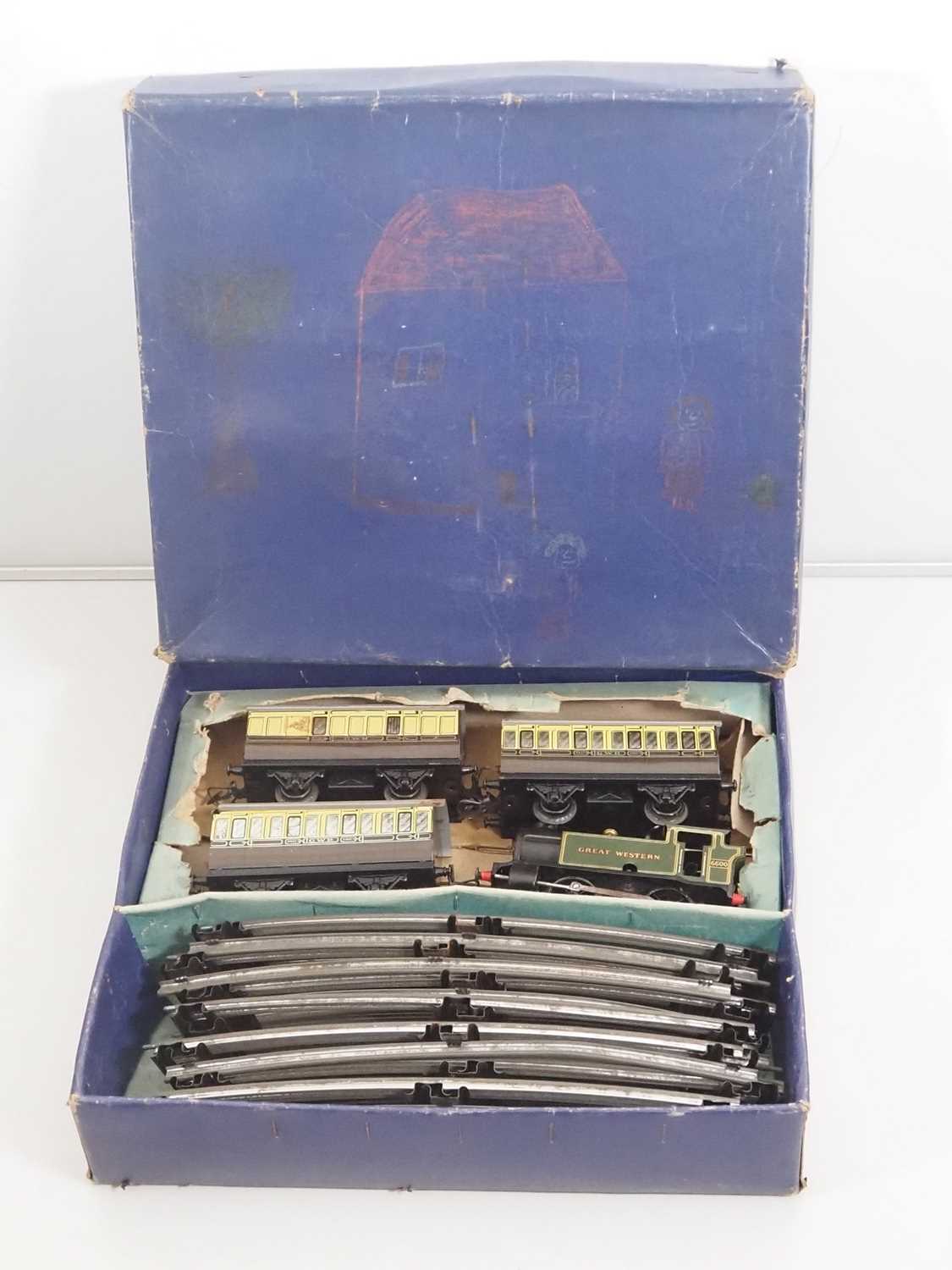 Lot 599 - A HORNBY O gauge clockwork GWR tank passenger...