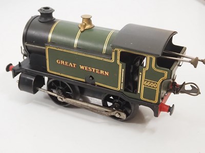 Lot 599 - A HORNBY O gauge clockwork GWR tank passenger...