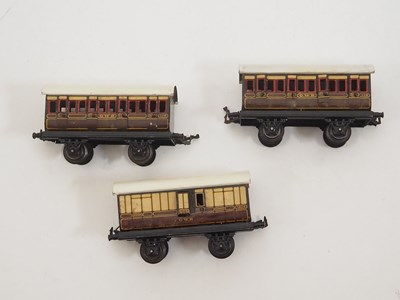 Lot 607 - A group of O gauge very early BING 4-wheel...