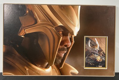 Lot 342 - A mounted and signed photograph of IDRIS ELBA...