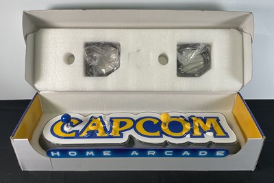 Lot 357 - A CAPCOM HOME ARCADE games console including...