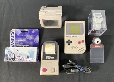 Lot 373 - A NINTENDO GAME BOY (1989) and accessories...