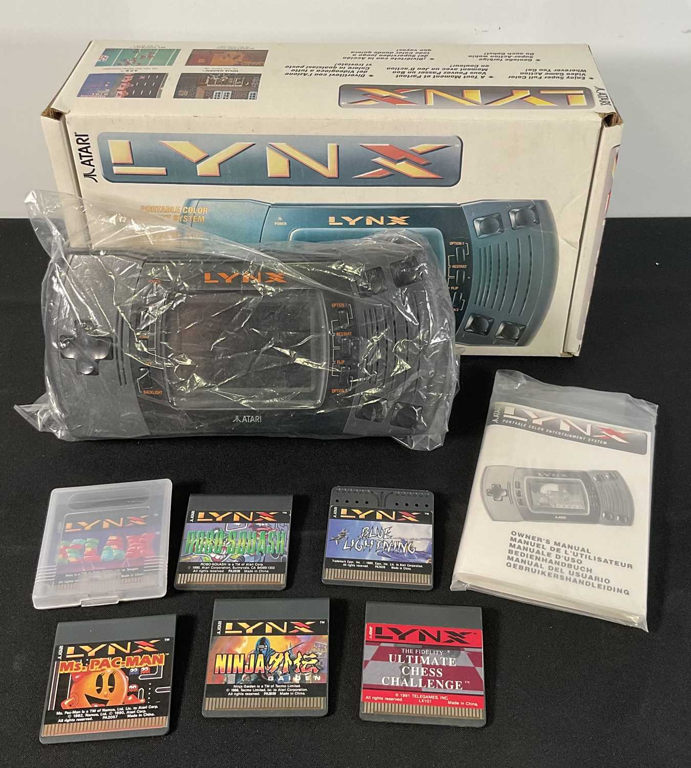 Lot 378 - An ATARI LYNX handheld games console, boxed in...