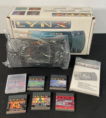 Lot 378 - An ATARI LYNX handheld games console, boxed in...