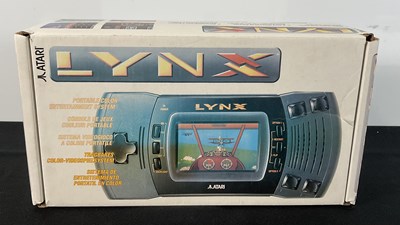 Lot 378 - An ATARI LYNX handheld games console, boxed in...