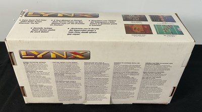 Lot 378 - An ATARI LYNX handheld games console, boxed in...