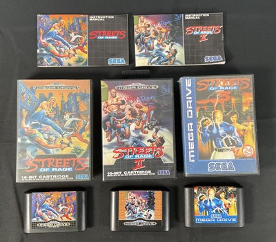 Lot 551 - SEGA MEGA DRIVE - A group of three boxed video...