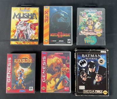 Lot 534 - SEGA GENESIS - A group of six boxed Sega...