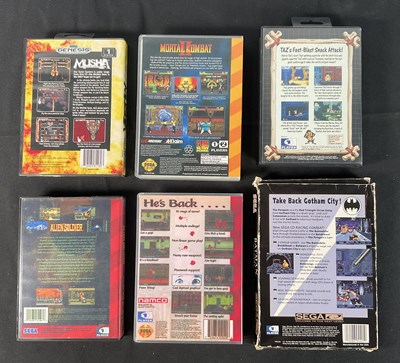 Lot 534 - SEGA GENESIS - A group of six boxed Sega...