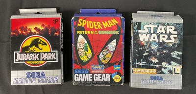 Lot 527 - SEGA GAME GEAR - A group of movie related...