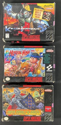 Lot 591 - SUPER NINTENDO (SNES) - A group of three boxed...