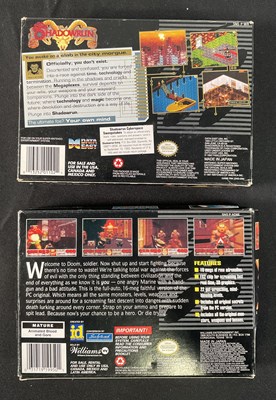 Lot 597 - SUPER NINTENDO (SNES) - Two boxed and complete...