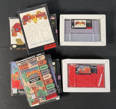Lot 597 - SUPER NINTENDO (SNES) - Two boxed and complete...
