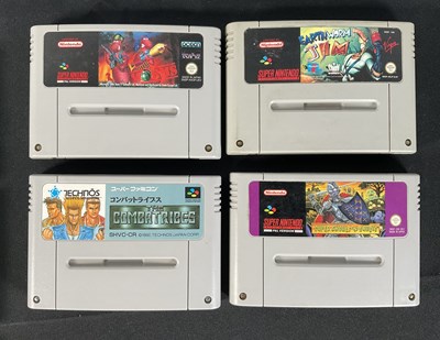 Lot 585 - SUPER NINTENDO (SNES) - A group of loose video...
