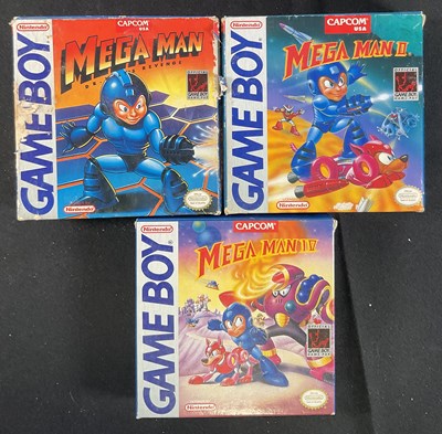 Lot 469 - NINTENDO GAME BOY - A group of three boxed...