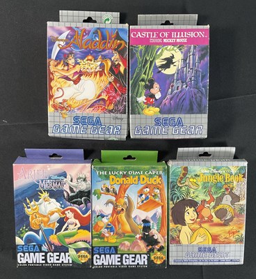 Lot 525 - SEGA GAME GEAR - A group of boxed Disney...