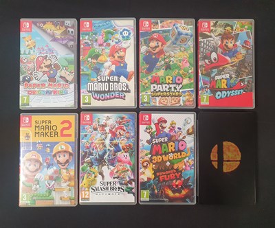 Lot 492 - NINTENDO SWITCH - A group of boxed Super Mario...