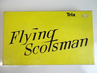 Lot 465 - OO SCALE MODEL RAILWAYS: A TRIX 1180 steam...