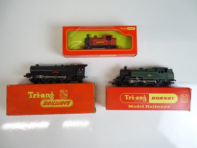 Lot 489 - OO SCALE MODEL RAILWAYS: A group of TRI-ANG...