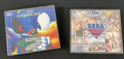 Lot 555 - SEGA MEGA DRIVE - A pair of SEGA MEGA CD video...