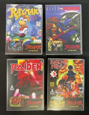 Lot 389 - ATARI JAGUAR - A group of four boxed Atari...