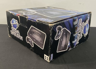 Lot 567 - SEGA SATURN - A boxed SEGA SATURN console with...