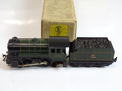 Lot 526 - OO SCALE MODEL RAILWAYS: A TRIX TWIN 1/520 0-4-...