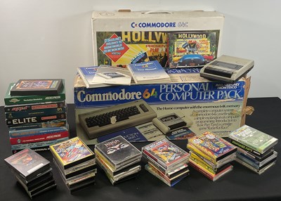 Lot 393 - COMMODORE - A boxed COMMODORE 64 and COMMODORE...